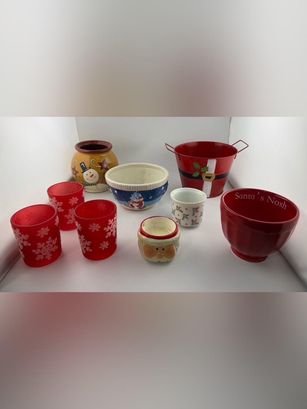 9 Christmas-themed holiday containers and table decorations.